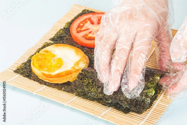 Obraz Close up of the process of making delicious sushi