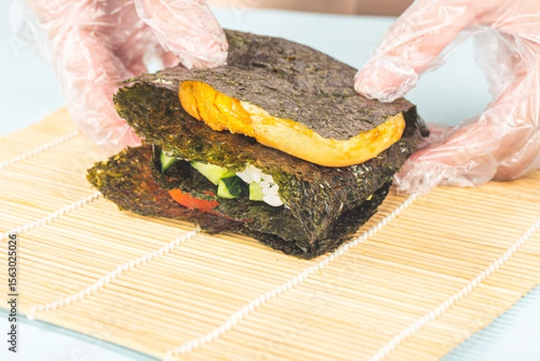 Obraz Close up of the process of making delicious sushi
