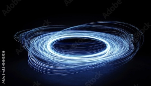 Fototapeta Light trails form an oval shape on a dark background