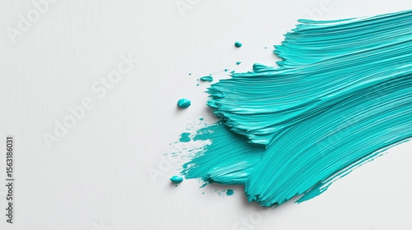 Fototapeta Vibrant turquoise paint strokes on a smooth surface enhance creativity