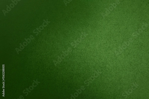 Fototapeta Solid green tone color paint on blank eco environmental friendly cardboard box paper texture background with space minimal simple style 