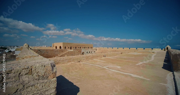 Fototapeta Roof top view from LE FORT ottoman in Mahdia. Walls and roof shot of Borj el Kebir fortress situated on the banks of Mediterranian Sea.