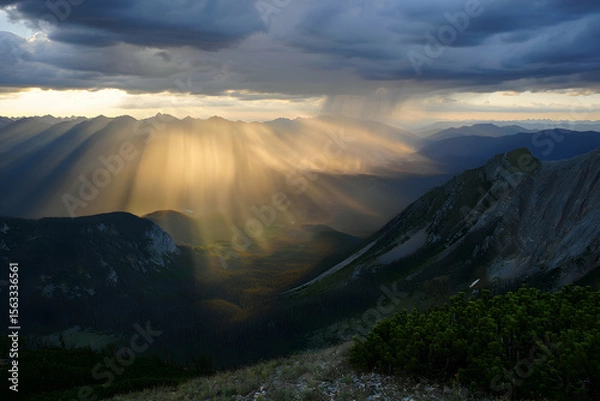 Fototapeta Dramatic Mountain Landscape with Sunlight Beams