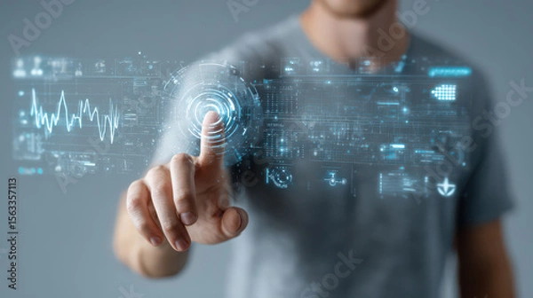 Fototapeta Man touching virtual interface with futuristic digital graphics