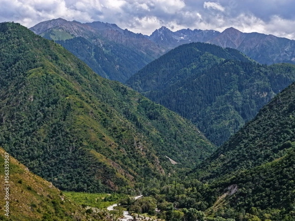 Fototapeta Talgar Gorge, a scenic mountainous area with varied vegetation, located in the Tian Shan range.