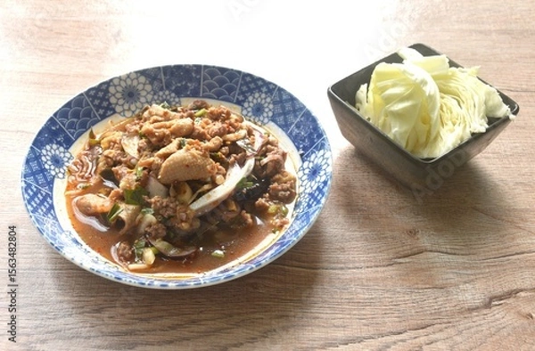 Obraz Thai spicy and sour chop duck meat salad and fresh cabbage on plate 