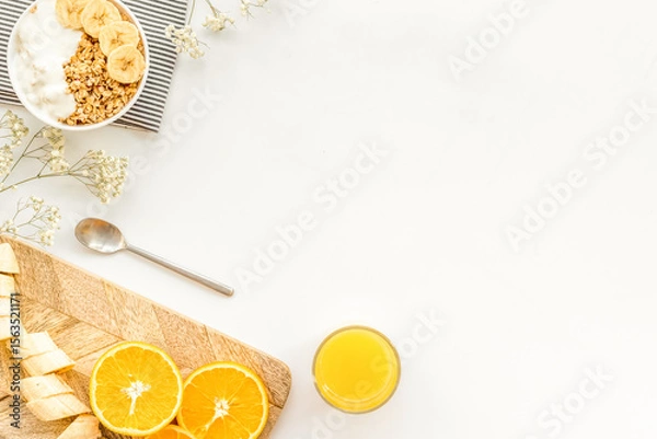Obraz food for healthy breakfast with granola and fresh orange juice on bright white background top view mock up