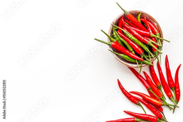 Obraz Fresh red and green chilli pepper as food ingredient on white table background top view mockup