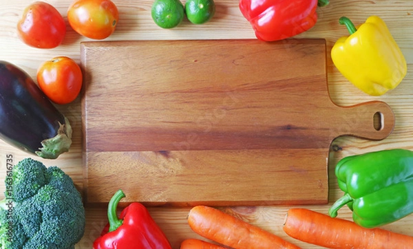 Obraz Frame of rainbow color assorted fresh vegetables on wooden background