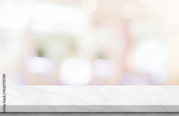 Fototapeta Empty white marble over blur background, for your photo montage or product display, Space for placing items on the table, product and food display.