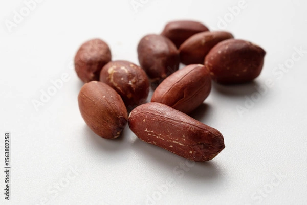 Fototapeta Peanut kernels isolated close-up.