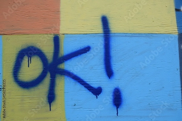 Obraz OK spray painted on a wall