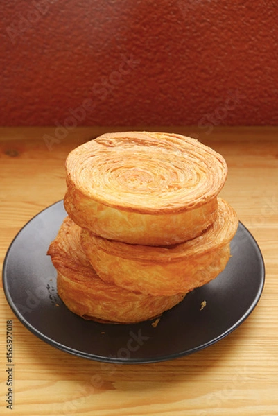 Obraz Stack of Delectable Supreme Croissants or New York Rolls on Wooden table