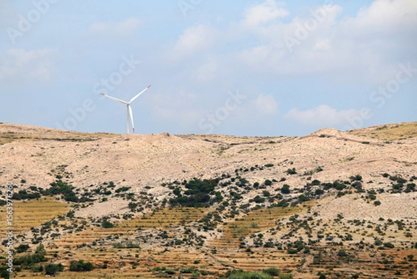 Obraz Wind turbine on the hill on island Pag, Croatia.