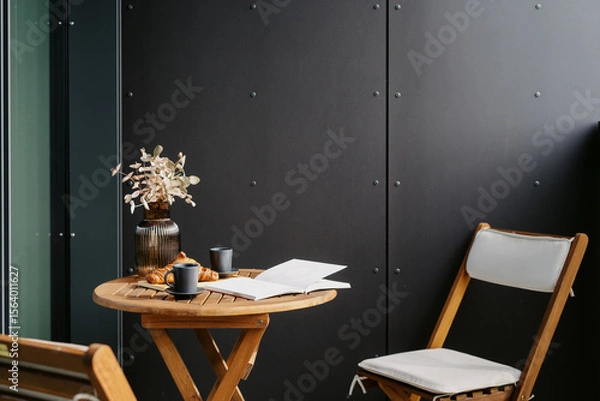 Obraz Stylish balcony in loft apartment with modern furniture and cozy setup