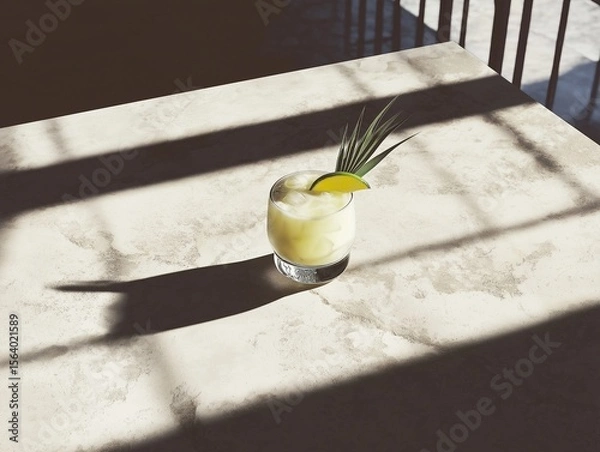 Fototapeta Creamy pina colada cocktail with lime on neutral stone background, top view.