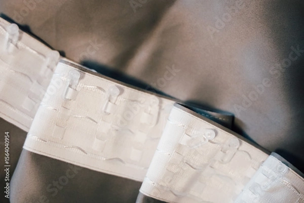 Obraz White fabric with woven design and stitching displayed in soft lighting