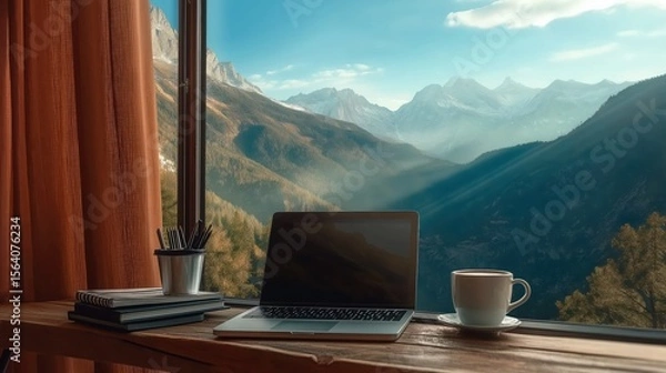 Obraz Remote work in nature – cozy wooden desk with laptop and coffee, overlooking majestic mountain view through window, digital nomad cabin lifestyle in harmony with nature

․
