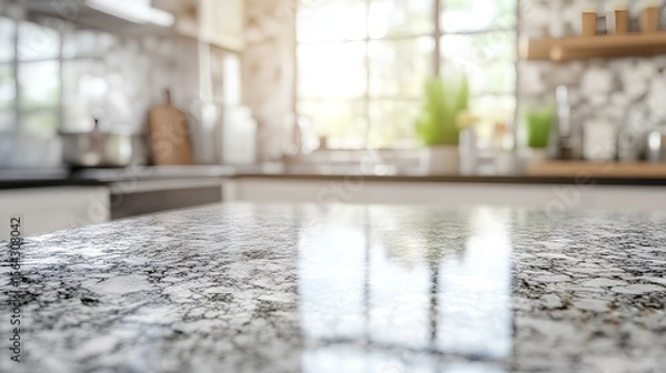 Fototapeta Kitchen Serenity: A sunlit kitchen showcasing an elegant countertop, capturing the essence of culinary creativity and inviting a sense of warmth.