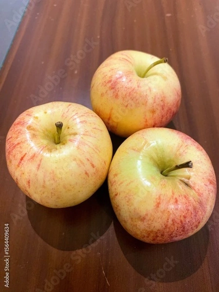 Obraz apples on a wooden table