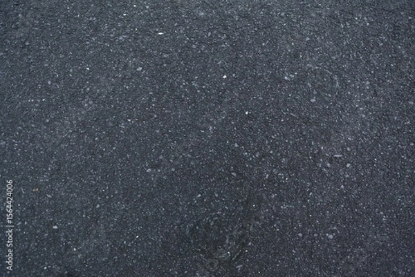 Fototapeta Realistic vector illustration showing rough asphalt surface with small stones and fine cracks