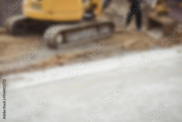Obraz Bulldozer levelling mud at construction site