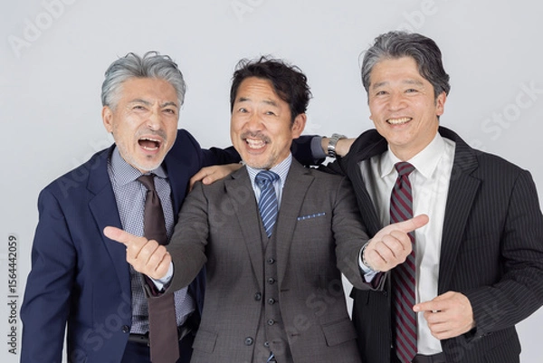 Fototapeta サムズアップをするミドルエイジ男性ビジネスパーソン