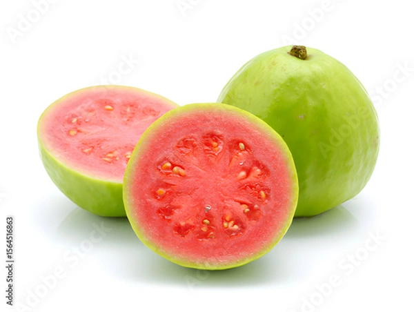 Fototapeta Fresh and vibrant still life showcasing the beauty of pink guava fruit, highlighting its unique color and texture against a clean white backdrop.