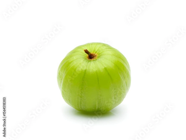 Fototapeta Single vibrant green amla fruit, also known as Indian gooseberry, showcasing its fresh, healthy appearance and distinctive ribbed texture against a clean white background.