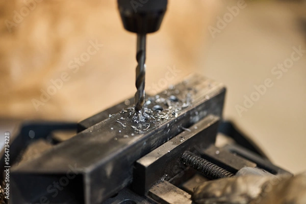 Fototapeta Close-Up of Metal Drilling Process with Industrial Accuracy and Precision
