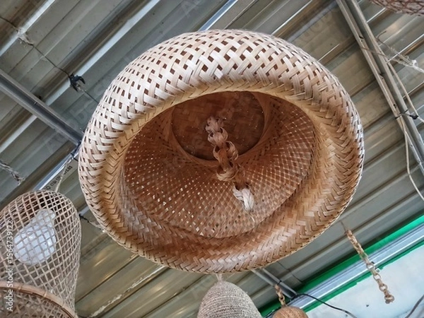 Fototapeta unique lamp shape with straw around the lamp