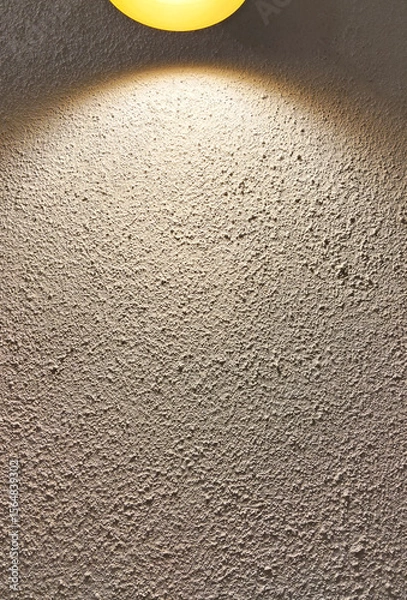 Fototapeta Textured Wall Surface Illuminated by Spotlight