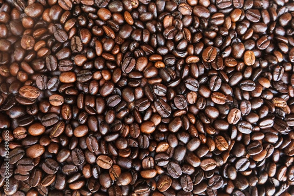 Fototapeta Coffee beans background. roasted coffee beans, can be used as a background. Close up and Macro.