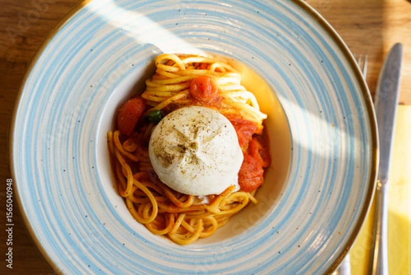 Obraz Spaghetti with tomato sauce and burrata cheese