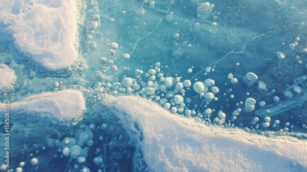 Fototapeta Frozen lake bubbles trapped under ice forming cellular structures. Cool blue/white palette with subtle turquoise undertones