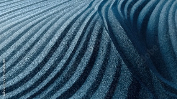 Fototapeta Smooth blue sand forming concentric ripples revealing meditative pattern, representing tranquil landscape with elegant minimalist texture and serene natural symmetry