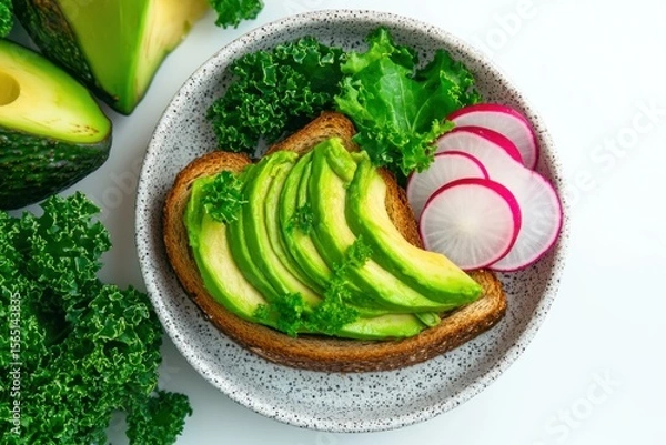 Fototapeta Vibrant Avocado Toast with Kale and Radishes: A Healthy and Visually Appealing Breakfast
