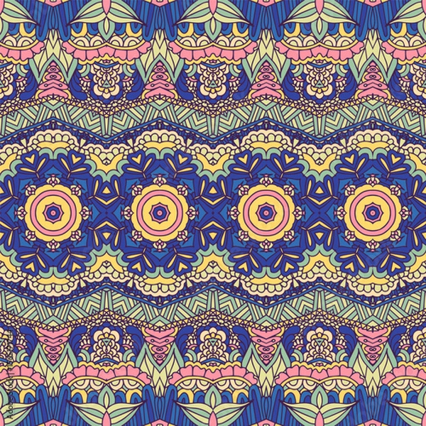 Fototapeta Vector seamless pattern intricate abstrac folk boho art style. Colorful ethnic geometric psychedelic print with mandalas
