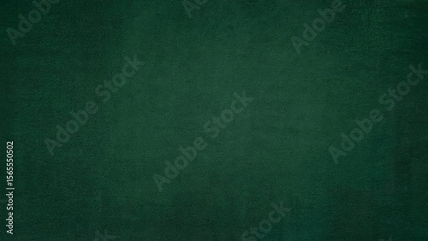 Obraz A deep textured emerald green background with subtle variations in shade and a slightly rough surface perfect for design