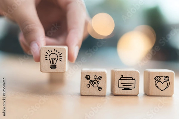 Fototapeta Design Thinking Process Concept – Wooden Blocks Displaying Icons Representing Key Stages of a Solution-Focused, Problem-Solving Methodology for Innovation and Strategic Development.
