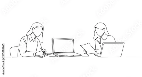 Obraz Women working together at a desk with laptops