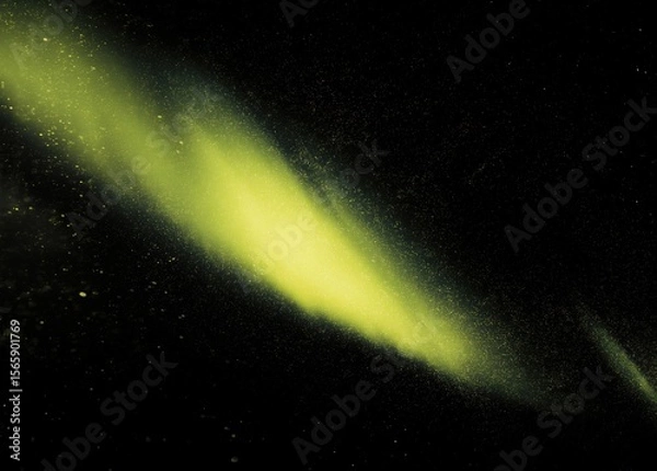Obraz Vibrant yellow beam creating abstract aurora pattern resembling bird head silhouette against grainy dark backdrop, vintage film aesthetic with dramatic monochrome lighting.