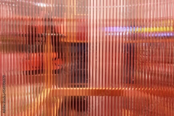Fototapeta Red Vertical Glass Striped Wall Background with Reflection Stair.