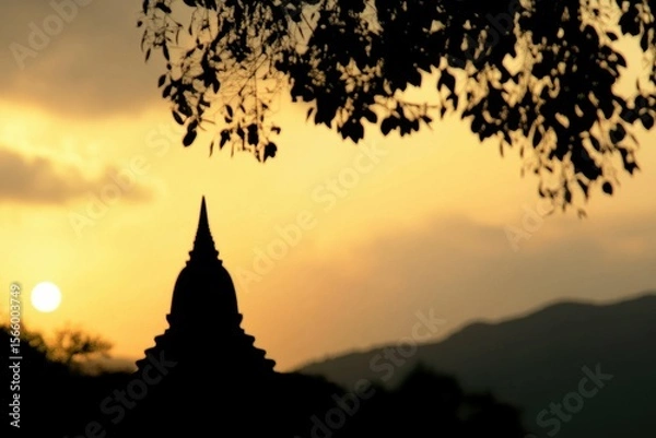 Fototapeta detailed color picture of silhouette of temple against sky