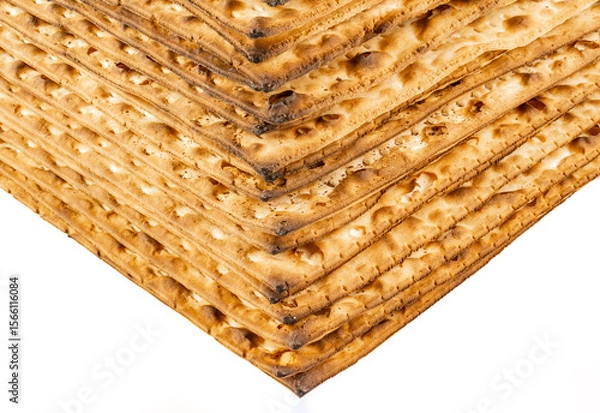 Fototapeta Close-Up View of Stacked Traditional Jewish Matzah Bread - Layered Texture of Unleavened Passover Crackers