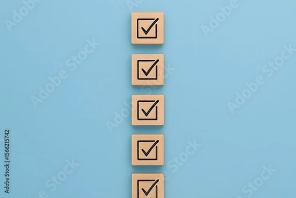Fototapeta Five wooden blocks with checkmarks in a vertical line on a blue background