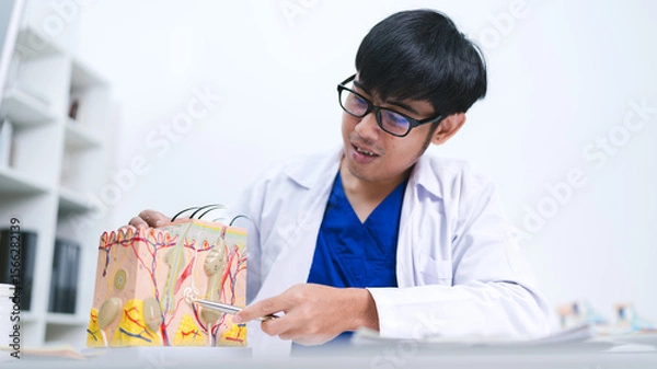 Fototapeta The dermatologist at the hospital examined the patient’s skin, identifying symptoms linked to a follicle problem and offering treatment for better human skin protection.