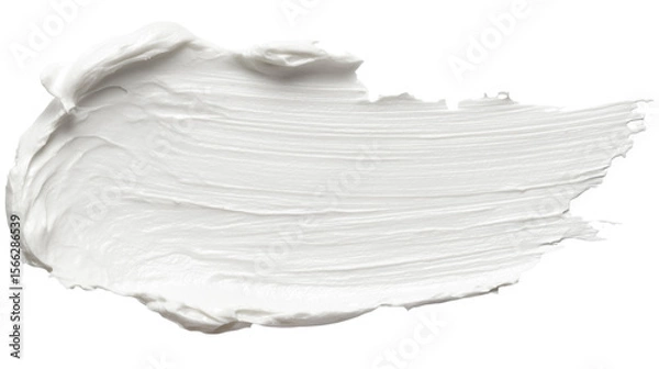 Fototapeta A swatch of thick, white cream or paint is shown isolated on transparent background. texture is creamy and spread in a slightly irregular, brush-stroke pattern.
