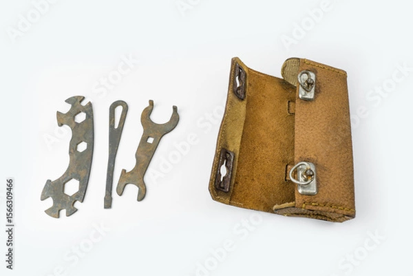 Fototapeta Old leather bicycle case for repair keys from 60’s