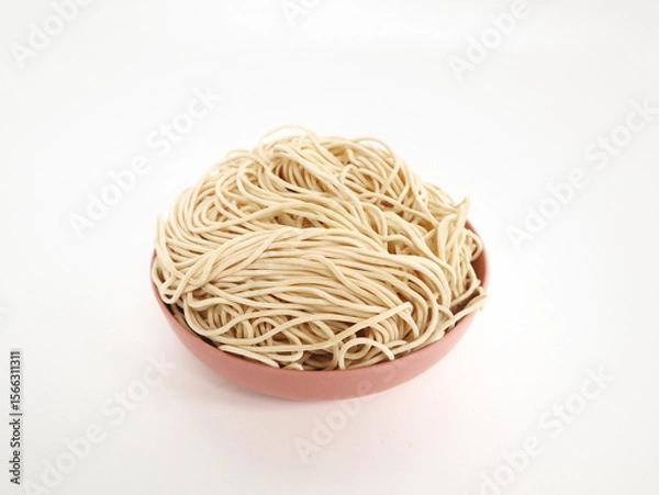 Obraz raw ramen noodle in pink bowl isolated on white background. fresh egg ramen noodle isolated on white background